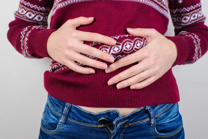 Cropped,Close,Up,Photo,Of,Woman's,Hand,Touching,Her,Full