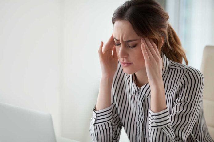 Tired,Stressed,Businesswoman,Feeling,Strong,Headache,Massaging,Temples,Exhausted,From